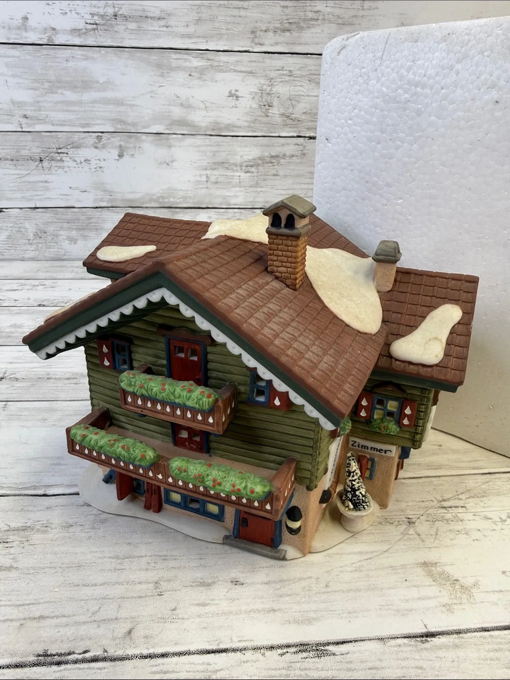 Department 56 “Sport Laden” Heritage Village Collection Alpine Village Series